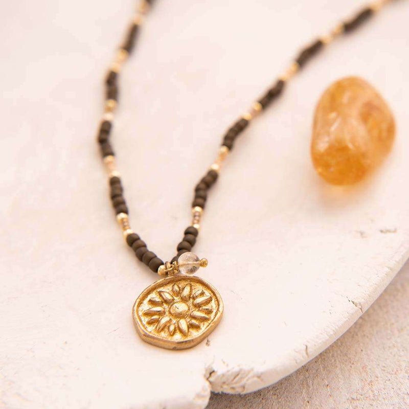 Caring Citrine Gold Colored Necklace Still Life