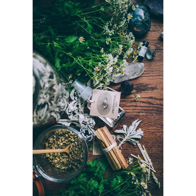 Palo Santo Protection Mist Laying on Table