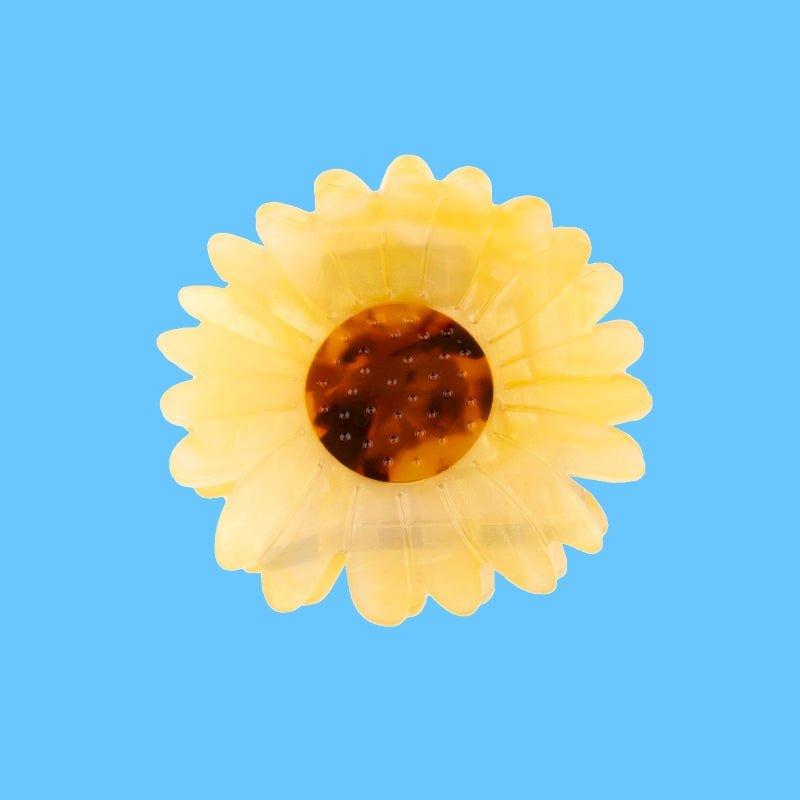Coucou Suzette Sunflower Hair Claw - Produktfoto türkiser Hintergrund