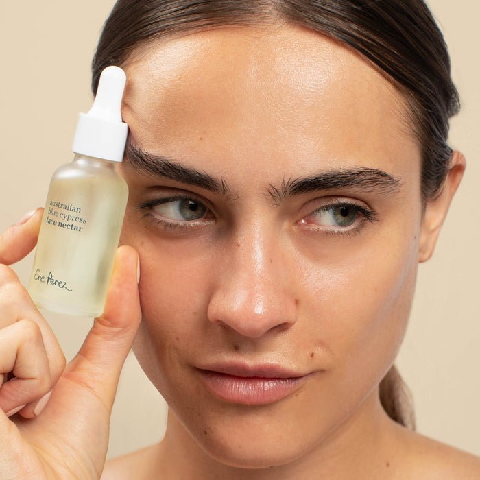 Ere Perez Australian Blue Cypress Face Nectar - Model with nectar