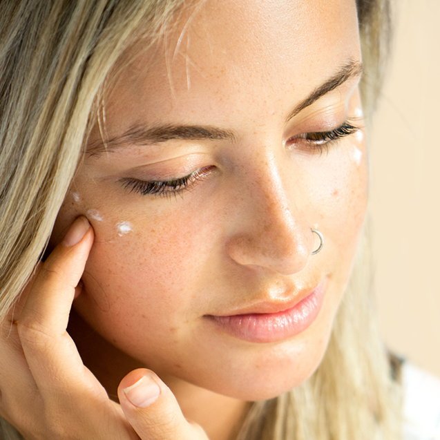 Ere Perez Cranberry Lip and Eye Butter - under eye on model