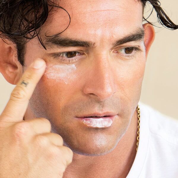 Ere Perez Cranberry Lip and Eye Butter - under eye on model