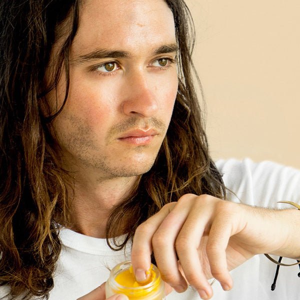 Ere Perez Papaya SOS Marmalade - open jar in front of model