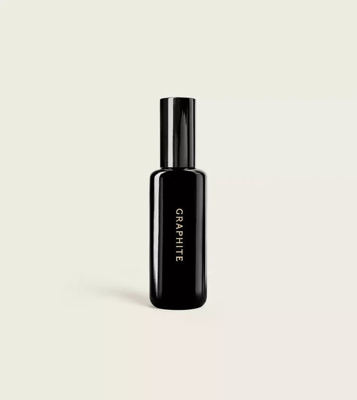 Graphite Parfum on beige background