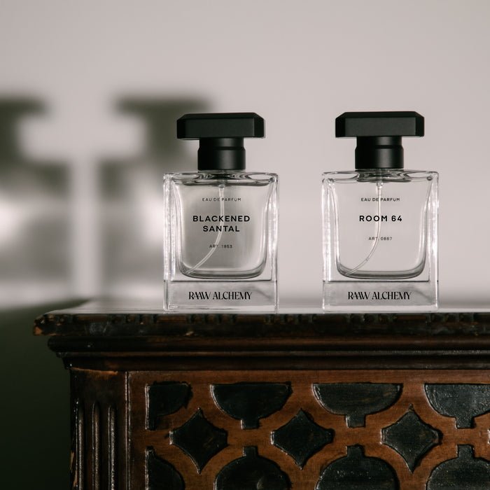 RAAW Alchemy Blackened Santal Eau De Parfum next to Room 64