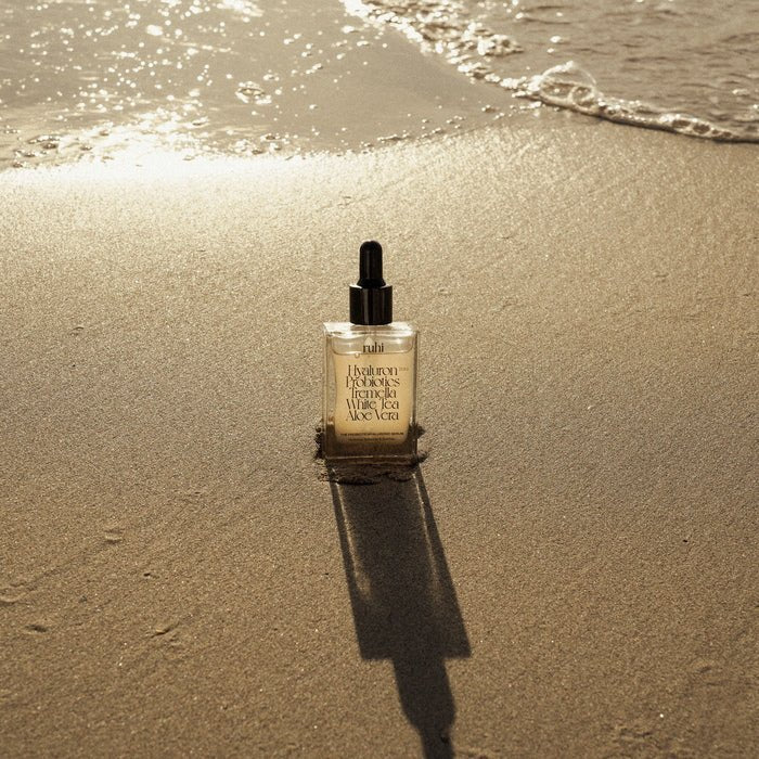 Ruhi Rituals The Probiotic Hyaluronic Serum beach scene