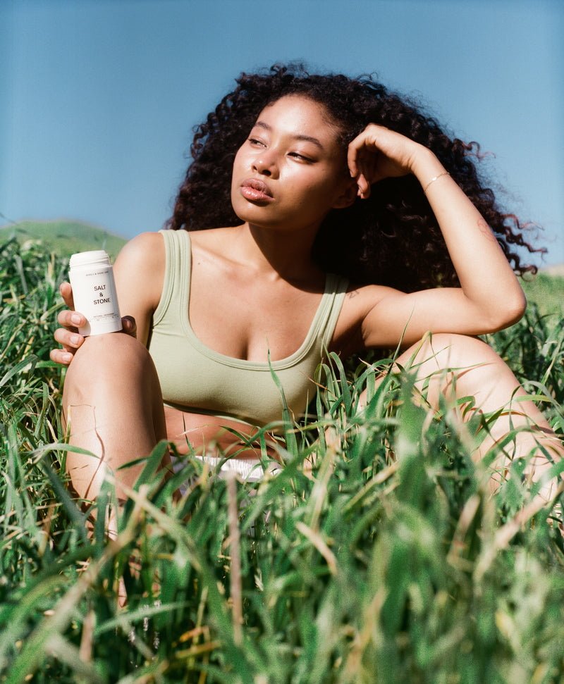 Model sitting with Deodorant