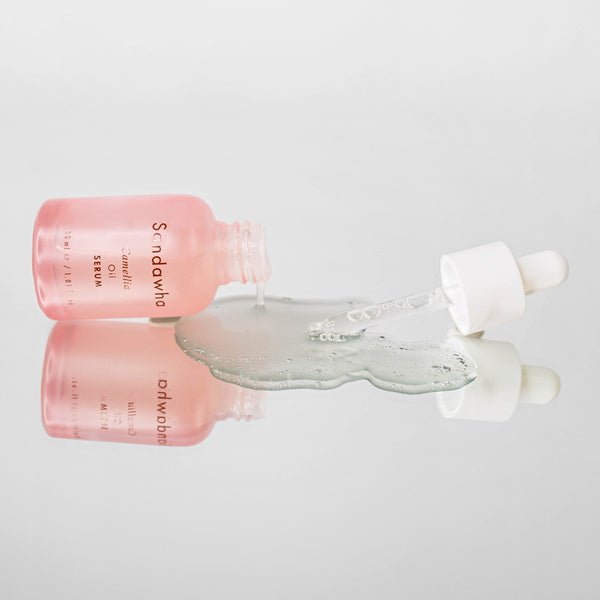 SanDaWha Camellia Oil Serum 30 ml - lying flat on mirror