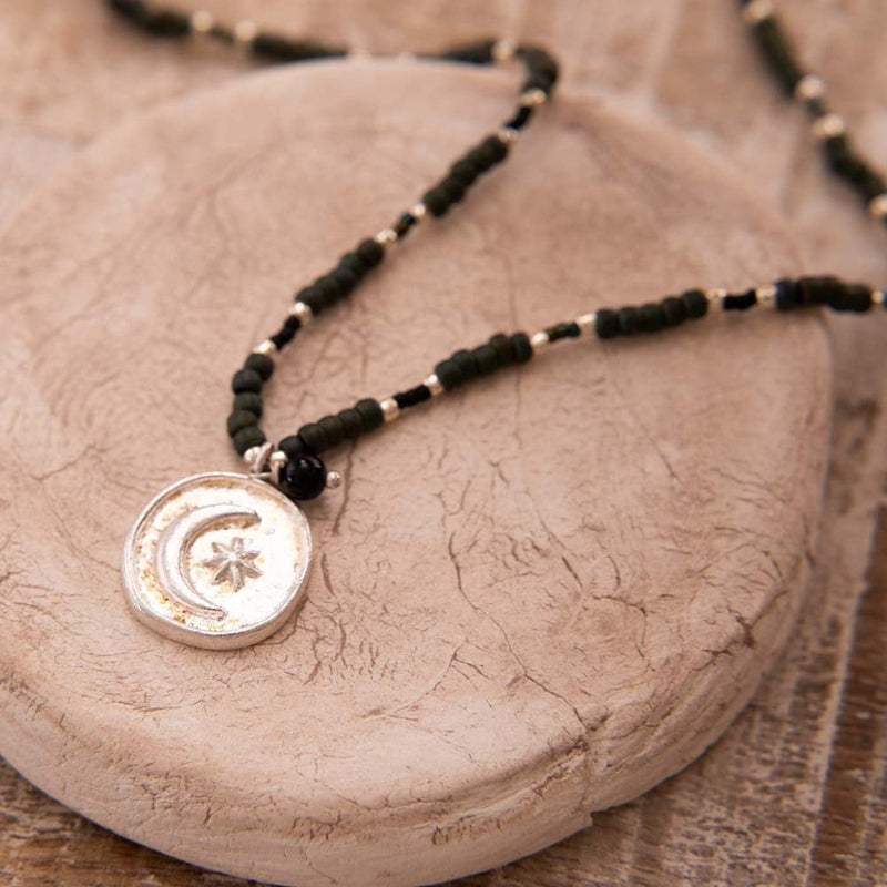 Caring Black Onyx Silver Colored Necklace Still Life