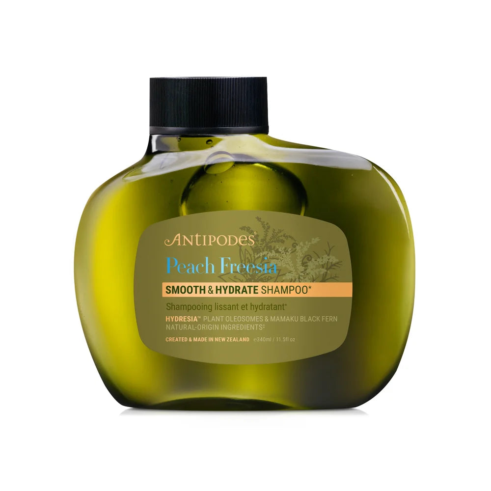 Antipodes Peach Freesia Smooth & Hydrate Shampoo 340 ml in grüner Flasche