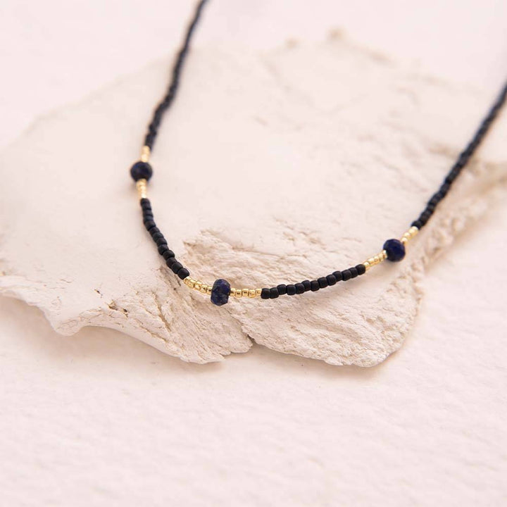 Brightly Lapis Lazuli Gold Colored Necklace Still Life