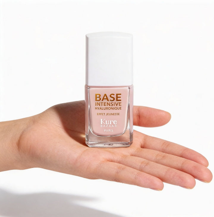 Base Intensive von Kure Bazaar - auf Handfläche