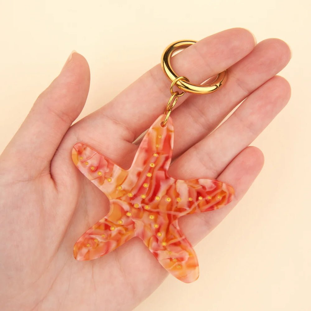 Starfish Charm von Coucou Suzette - an Ring aufgehängt