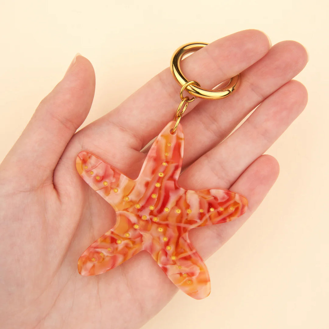 Starfish Charm von Coucou Suzette - an Ring aufgehängt
