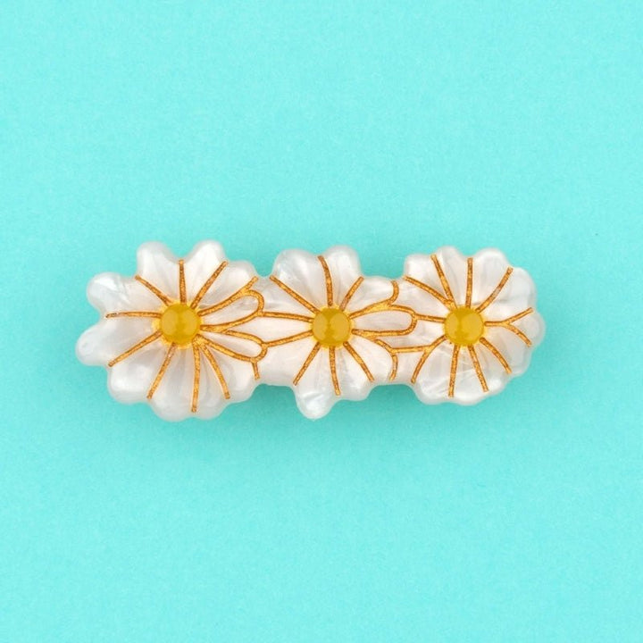 Coucou Suzette Daisies Hair Clip - Product turquoise background