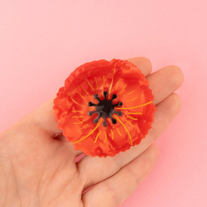 Coucou Suzette Poppy Hair Claw - product detail with hand model