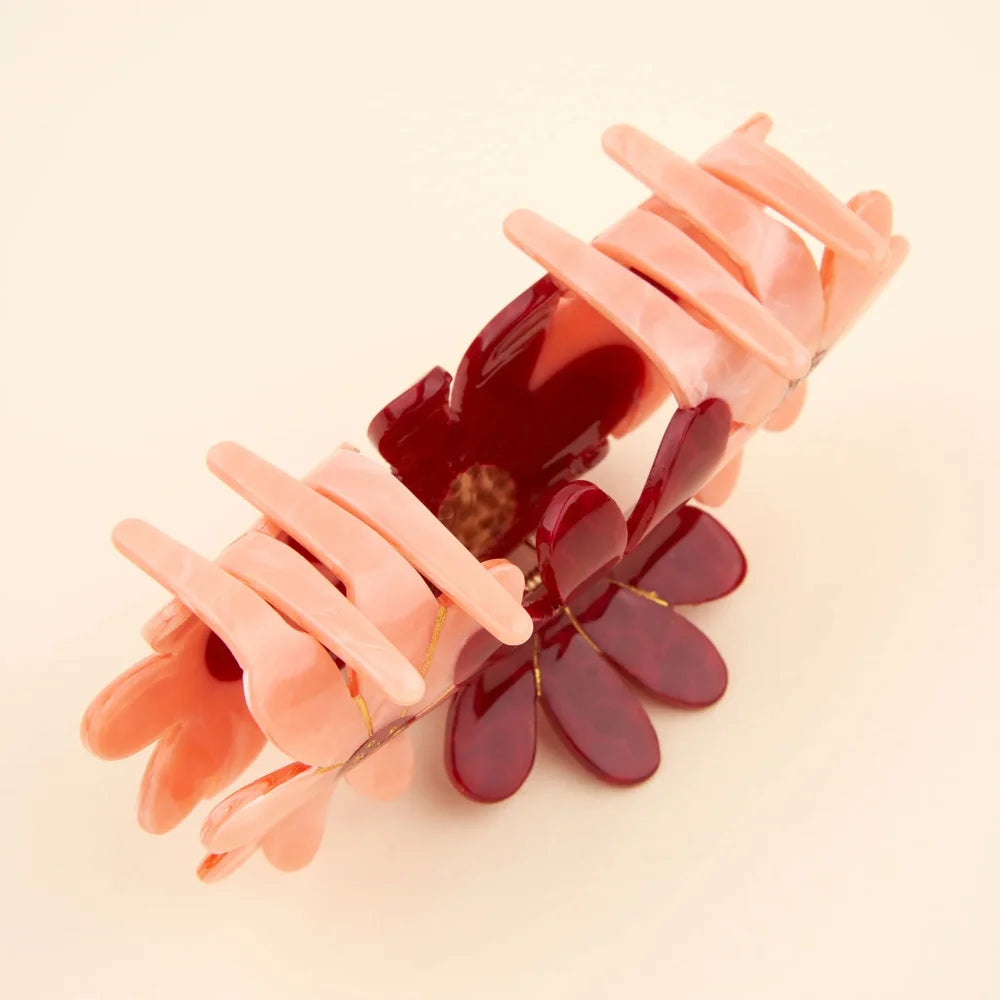 Rückseite der Pink Flower Trio Hair Claw mit großen Acetat-Zähnen