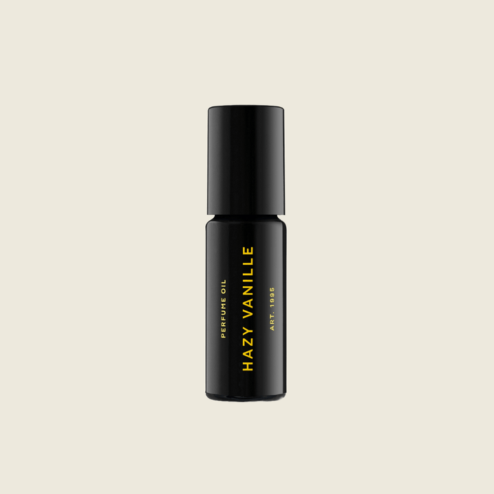 RAAW Alchemy Hazy Vanilla Perfume Oil - Product beige background