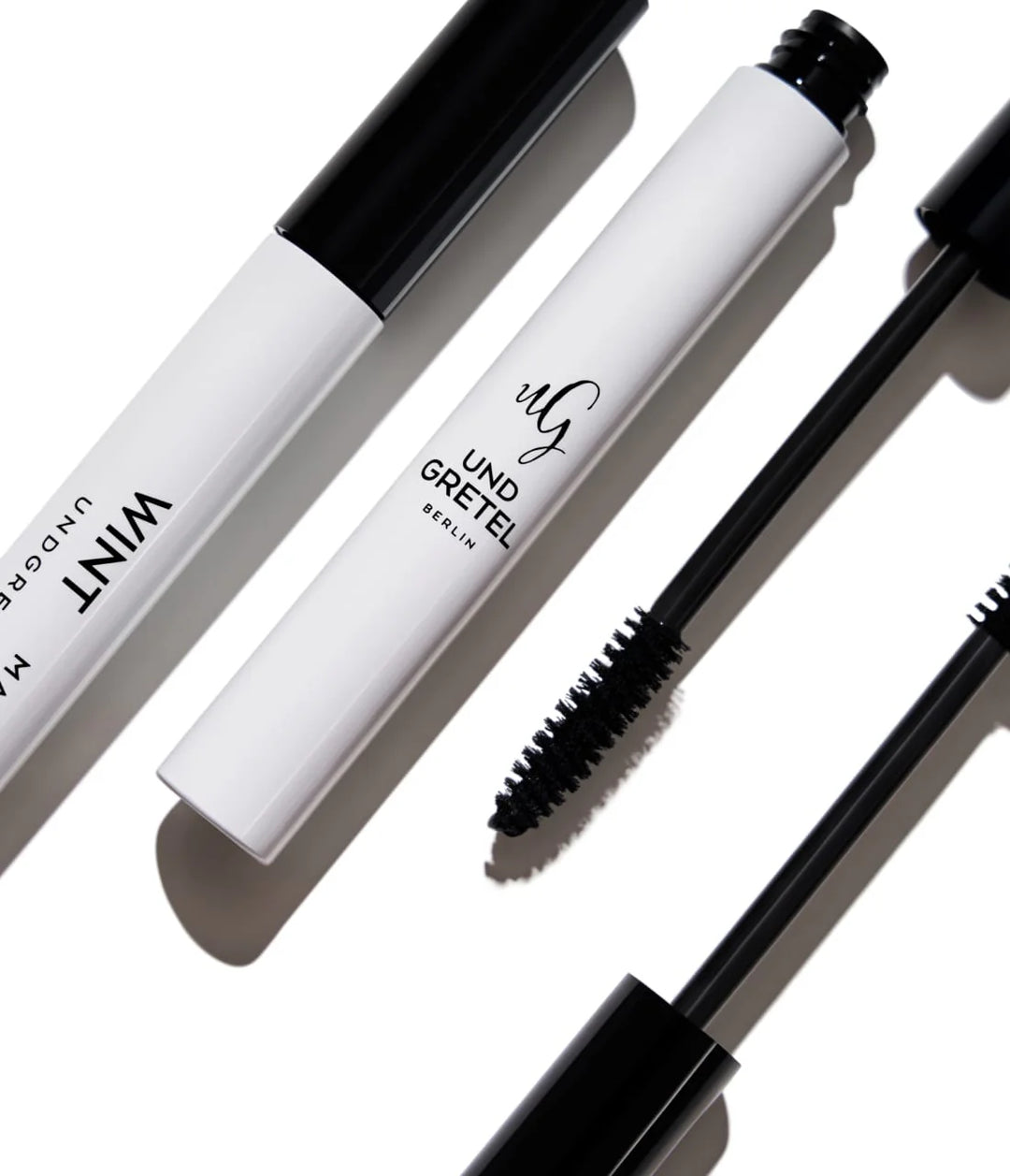 UND GRETEL WINT Mascara in mehreren Ansichten mit Flakon und Bürste