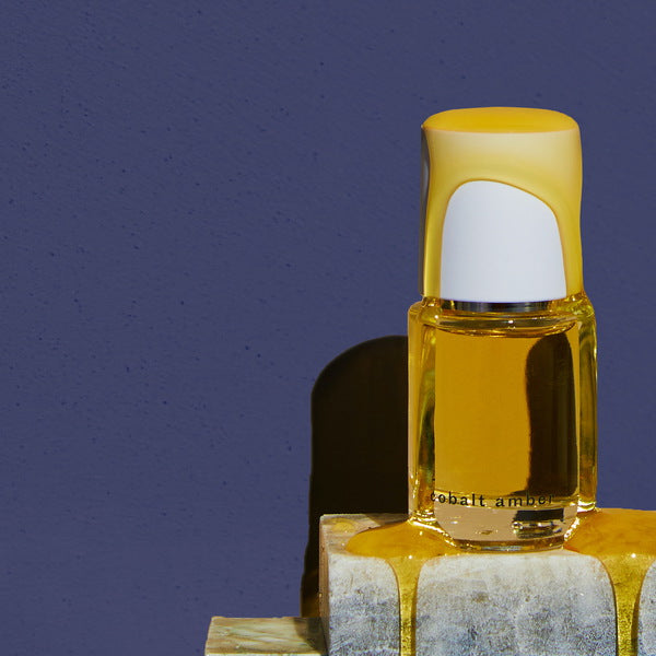 Abel Cobalt Amber Perfume mood shot with liquid amber