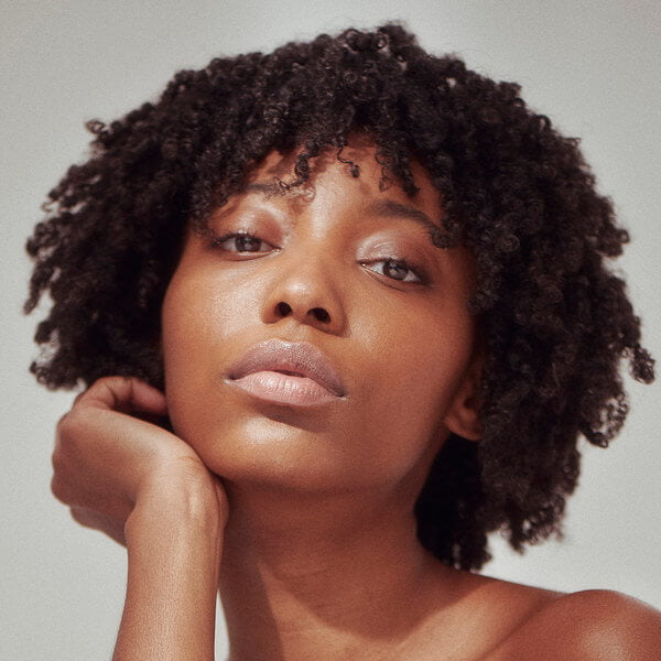 Henné Organics Luxury Lip Tint - Bare - on woman lips