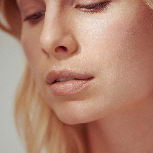 Henné Organics Luxury Lip Tint - Bare - on model lips