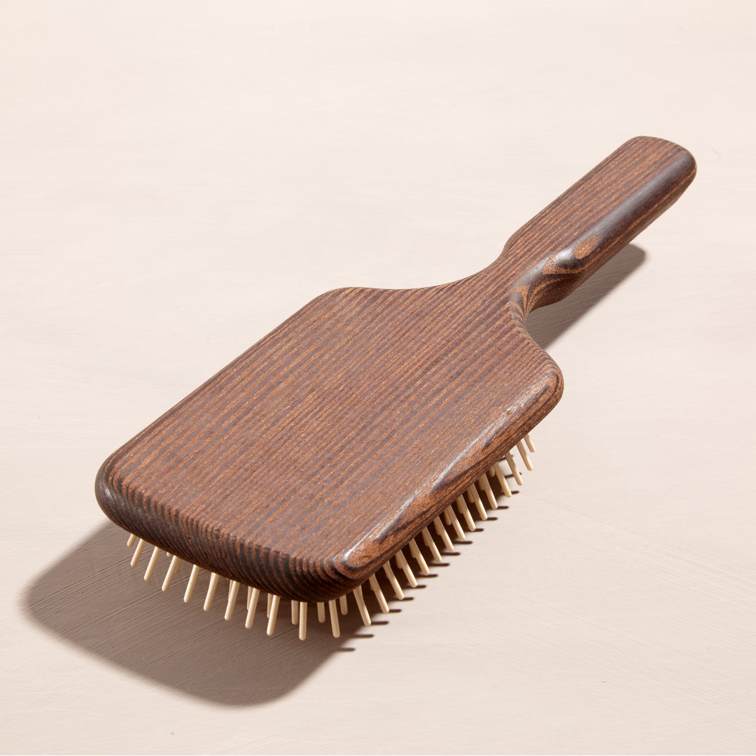 Paddle brush with wooden knobs - from back