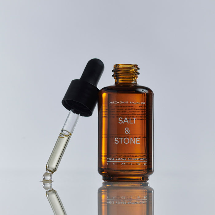 Salt & Stone Olio viso antiossidante Flacone aperto Lifestyle