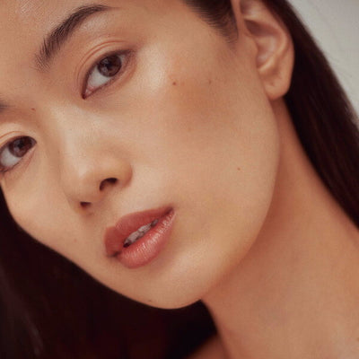 Henné Organics Luxury Lip Tint Intrigue on woman's lips
