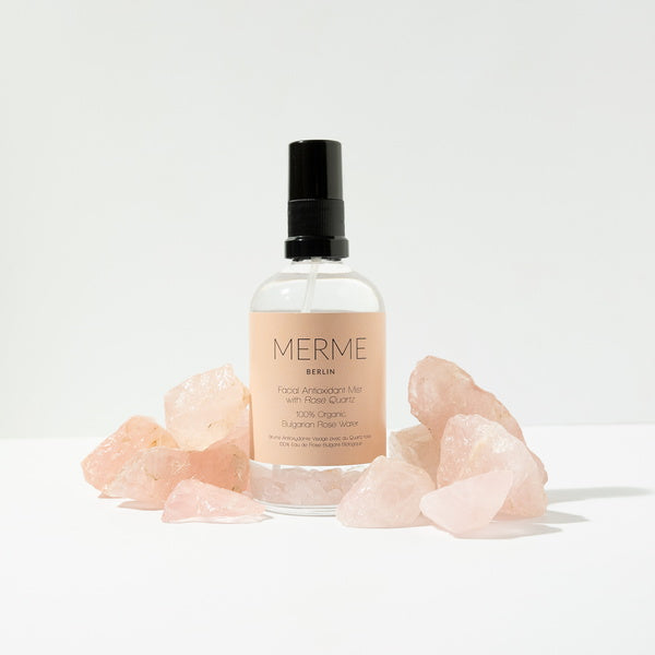 Merme Berlin Facial Antioxidant Mist With Rose Quartz 100% Organic Rosewater surrounded by rose quartz