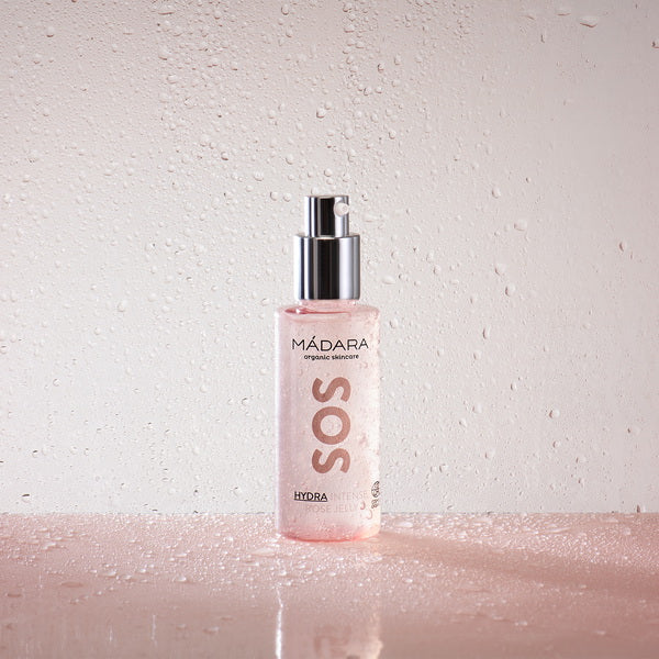 Mádara SOS Hydra Intense Rose Jelly | Rosenwasser-Gel - image with drops in the background