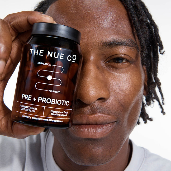 The Nue Co. Prebiotic + Probiotic with model